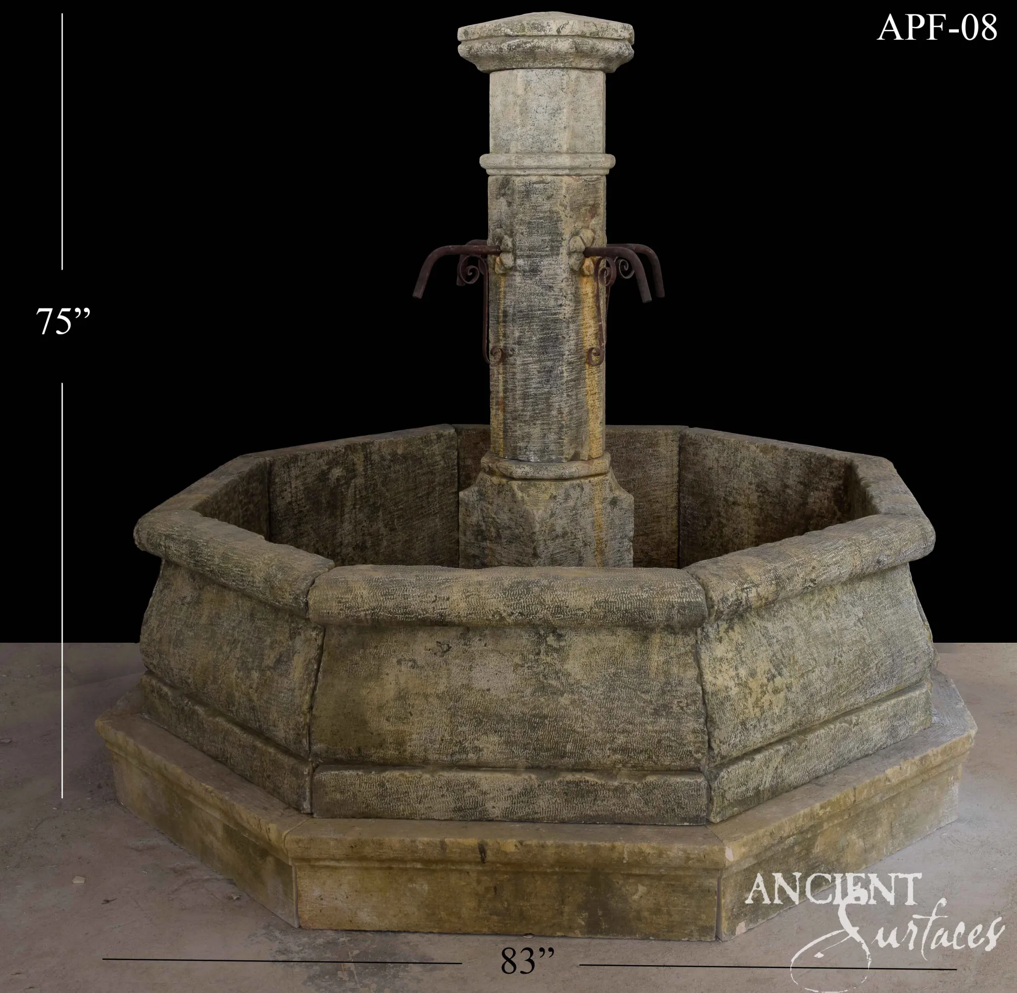 Heavily weathered octagonal reclaimed limestone pool fountain with a rustic central pillar