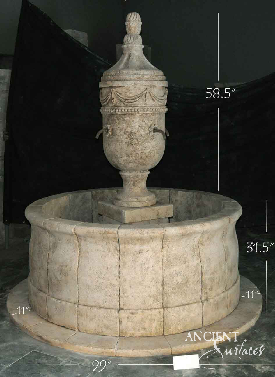 Swag-draped urn reclaimed limestone pool fountain on a fluted stem over a deep round basin